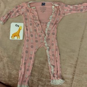 One piece snap pajamas.